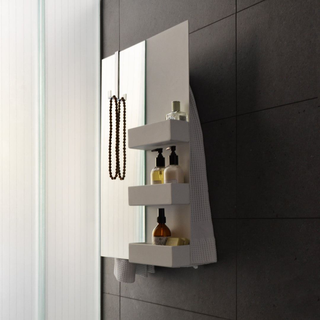 MG12 Geometrici Rectangle and Shelf towel warmer with mirror and heated shelves - close-up with toiletries
