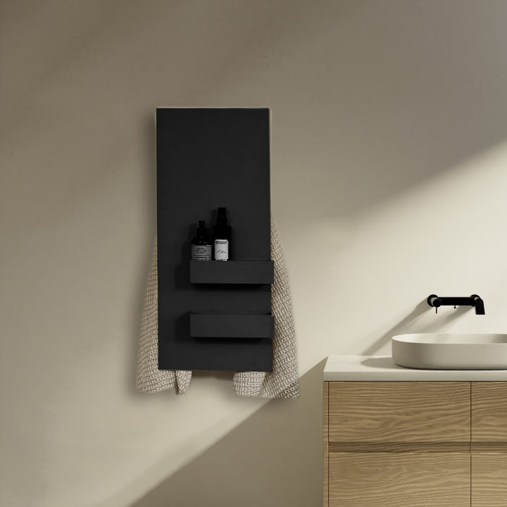 MG12 Geometrici Slim and Shelf towel warmer in black above a wood vanity