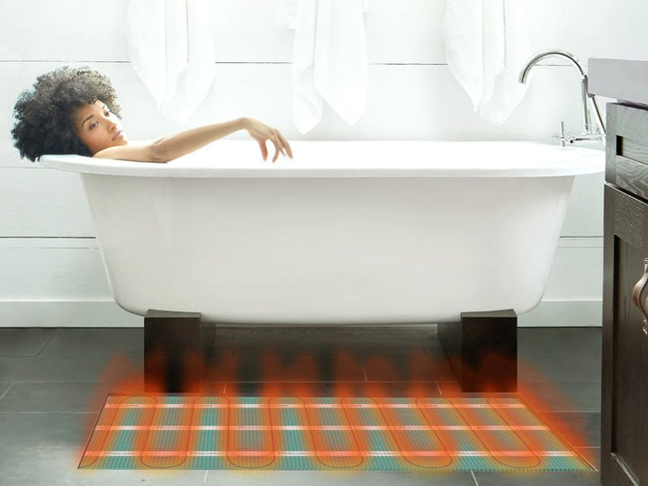 Bathroom with WarmlyYours radiant heated floor and freestanding tub